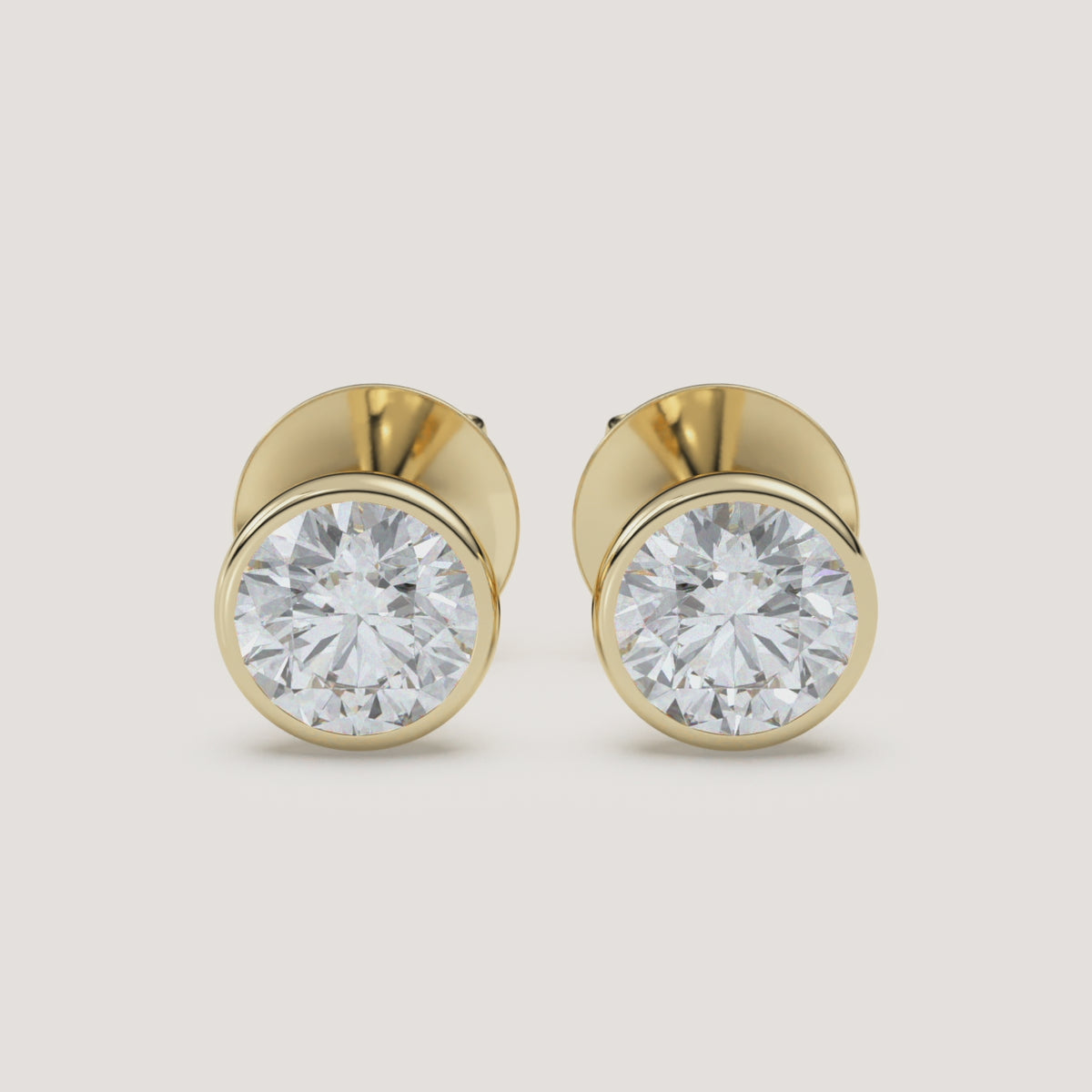 Round Bezel Diamond Stud Earrings — 2 CTW in 14k Yellow Gold (360° video)