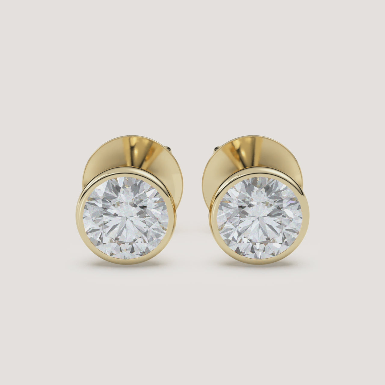 Round Bezel Diamond Stud Earrings — 2 CTW in 14k Yellow Gold (360° video)